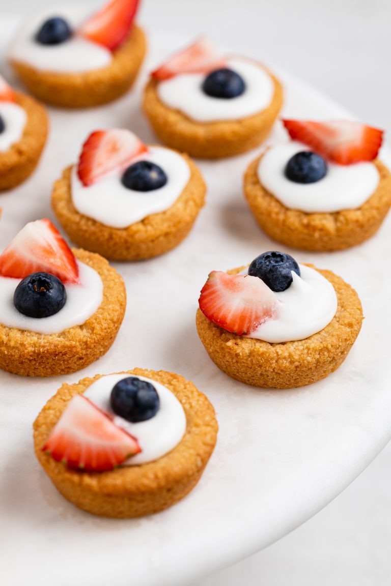 mini vegan berry shortcakes arranged on a cake stand