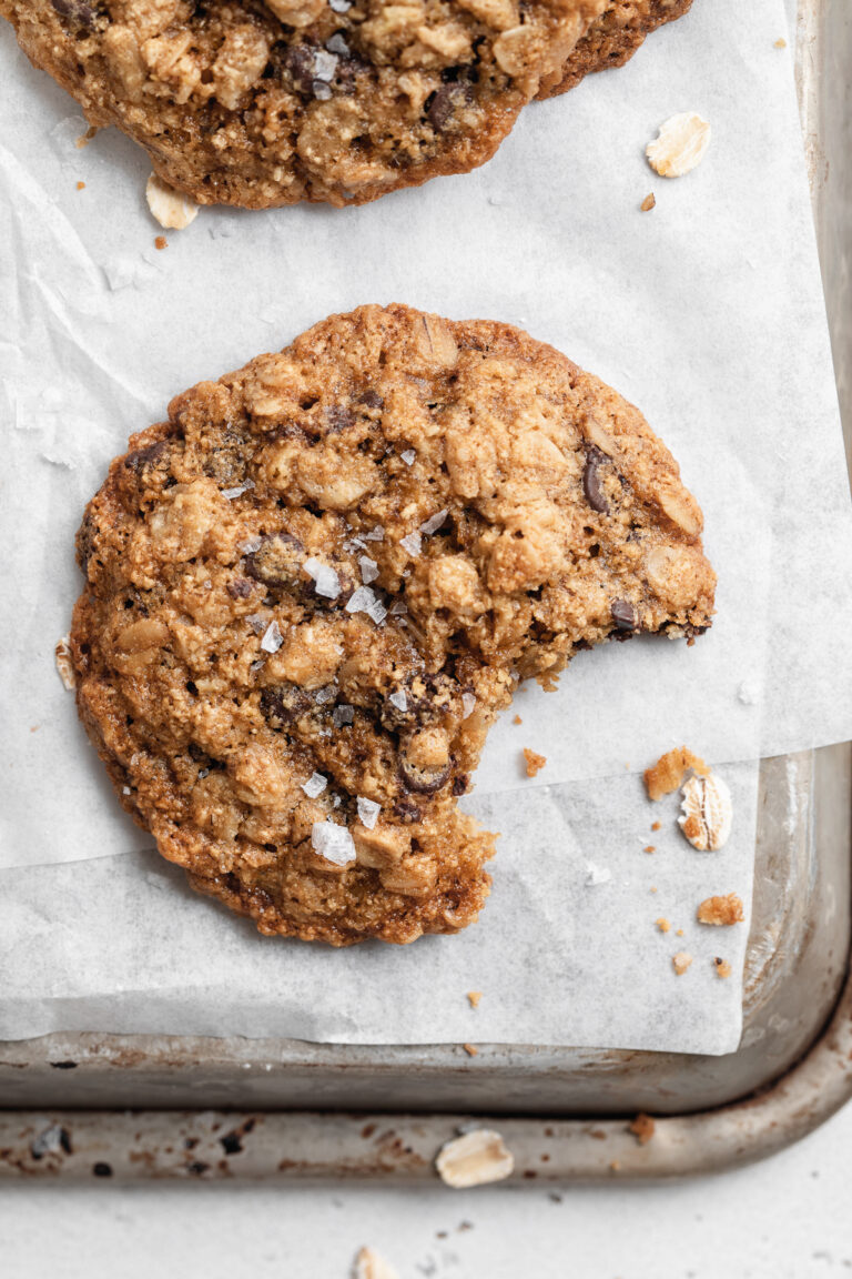 gluten-free oatmeal chocolate chip cookies with a bite taken out.