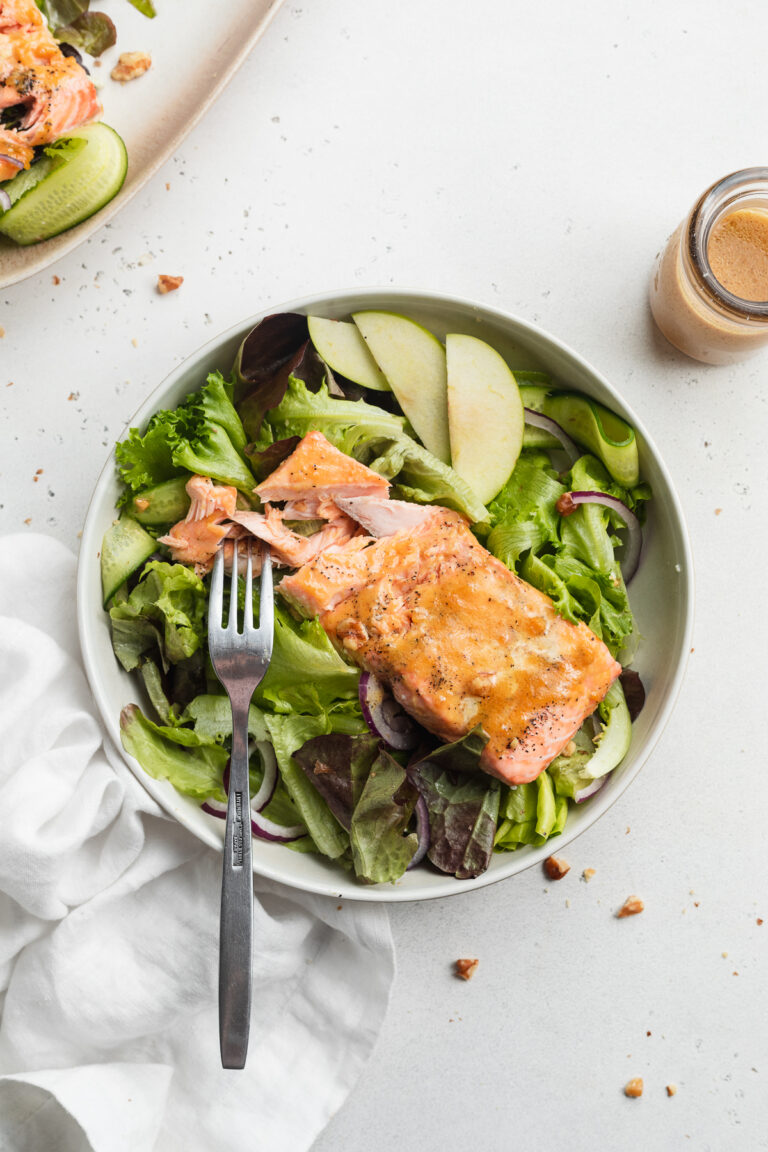 overhead image of maple dijon salmon salad in a bowl.