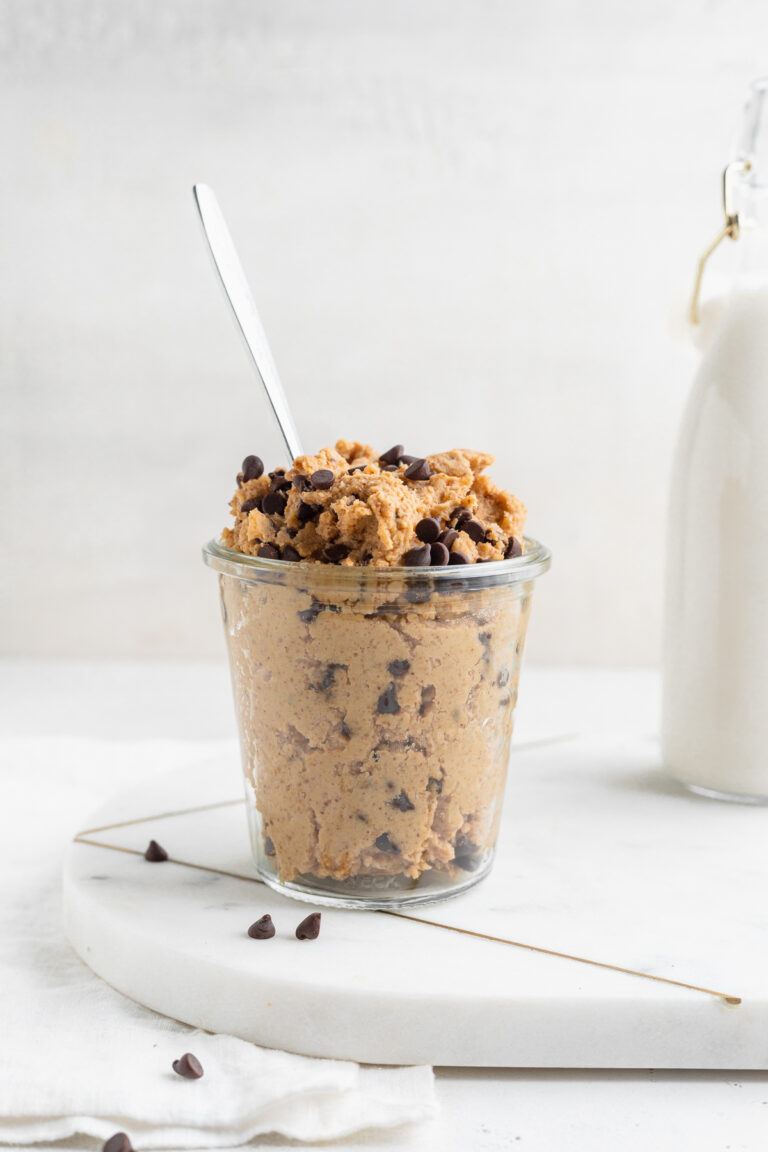 chickpea cookie dough in a jar with a spoon