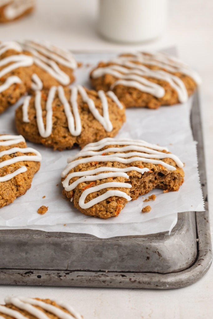 Healthy gluten-free carrot cake cookies on a baking sheet.