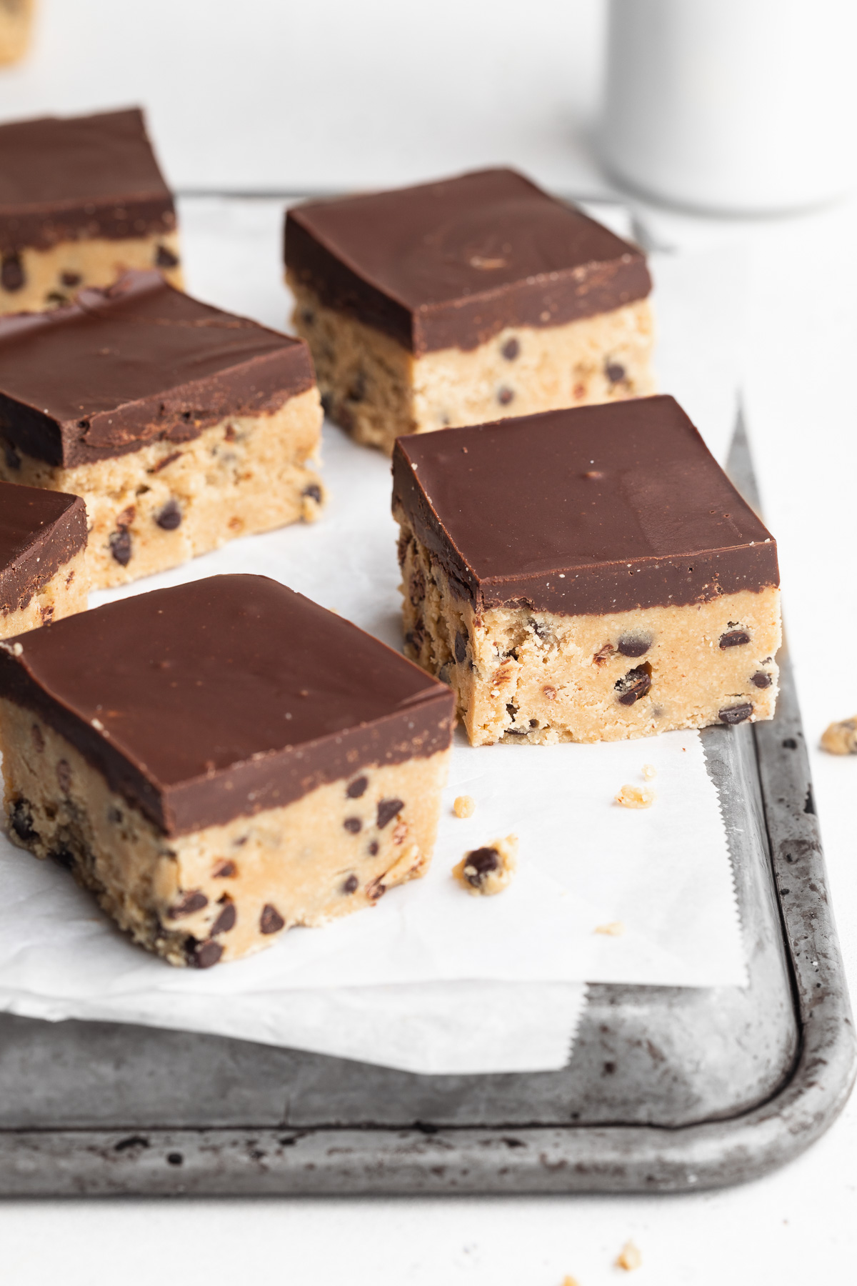 healthy no bake cookie dough bars on a baking sheet.