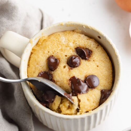 gluten free mug cake with chocolate chips on top.