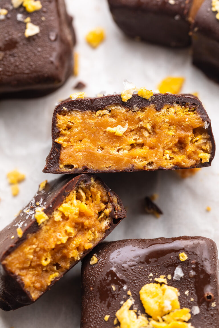 close up image of healthy butterfingers cut in half.