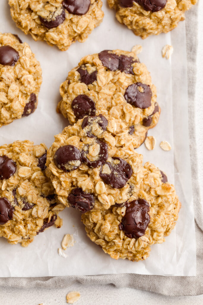 5 ingredient healthy oatmeal chocolate chip cookies on a baking sheet.