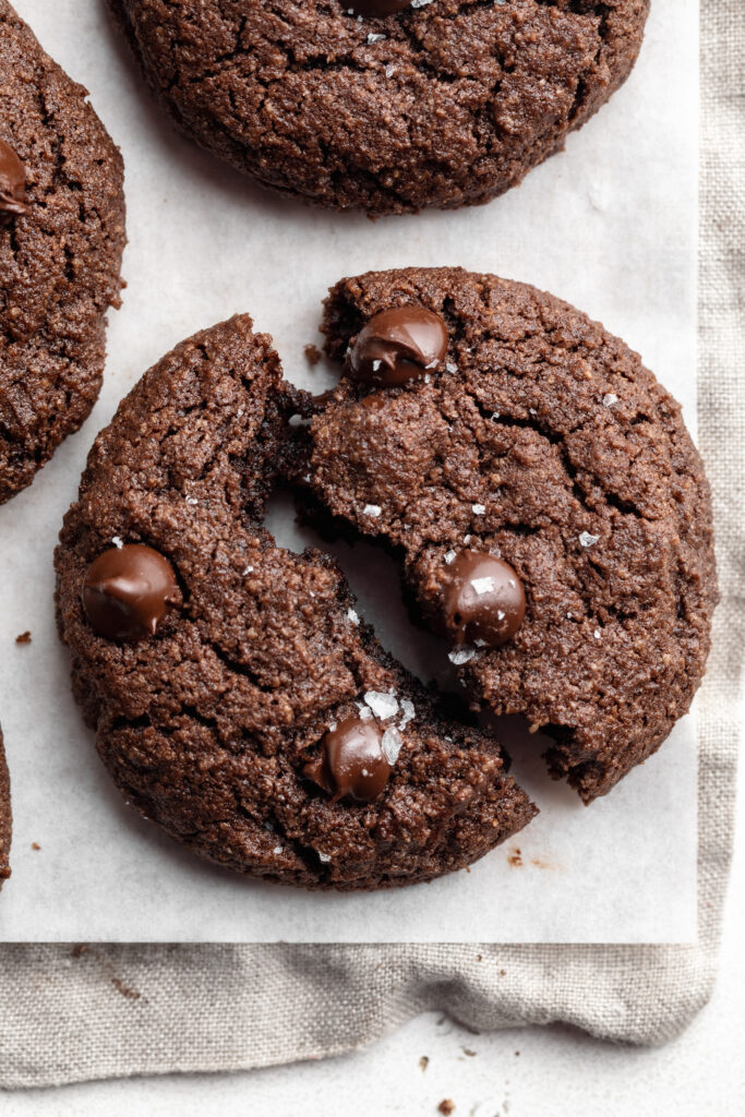an almond flour chocolate cookie split in half.