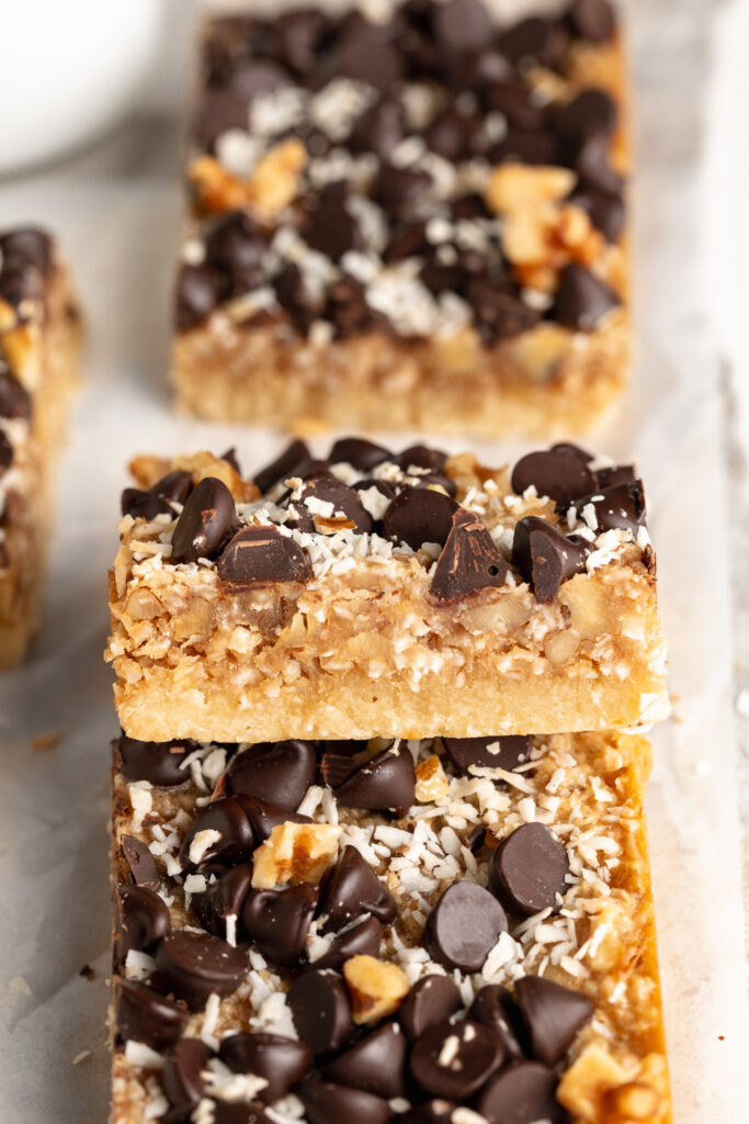two healthy gluten-free magic bars stacked on top of each other.