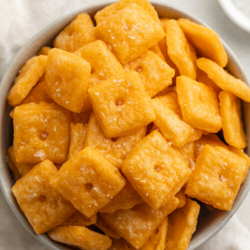 overhead image of a bowl of gluten free cheez its crackers.