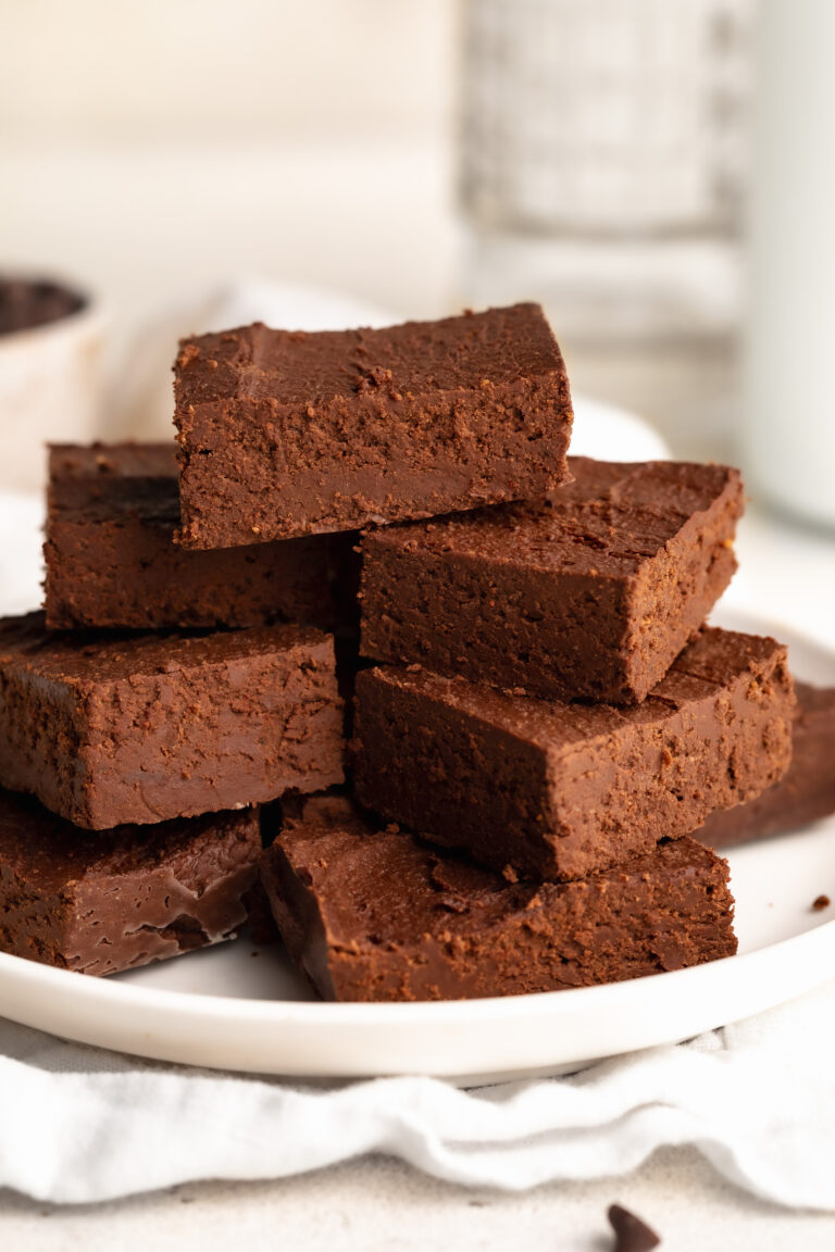 2 ingredient healthy fudge stacked on a plate.
