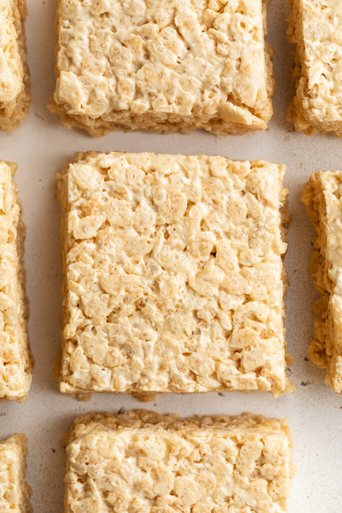 overhead image of protein rice crispy treats cut into squares.
