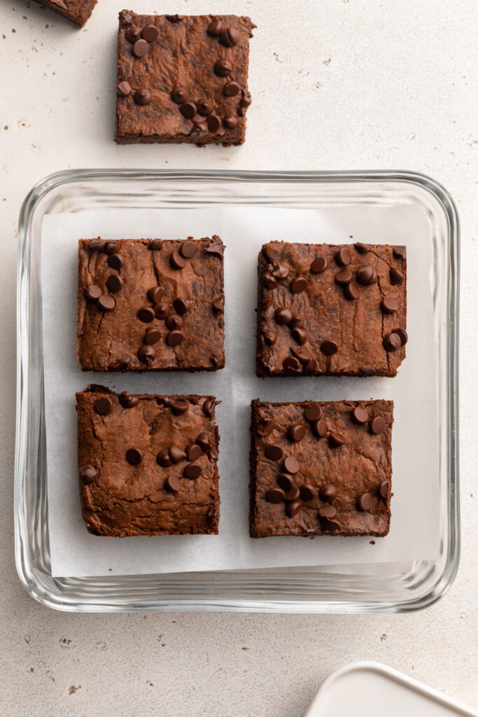 lactation brownies in a glass container ready to be frozen.
