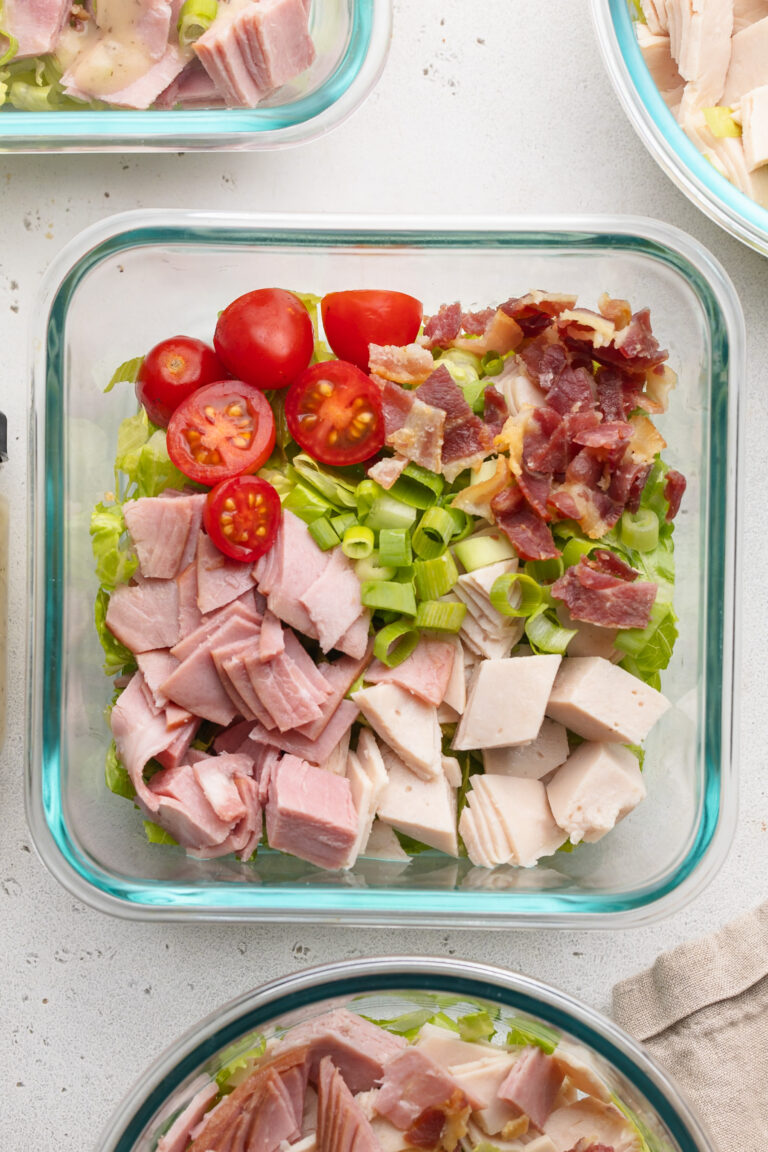 overhead image of a meal prep turkey club chopped salad.